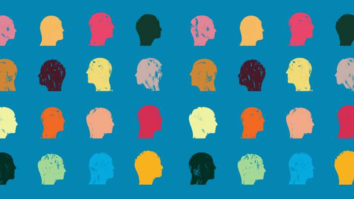 An illustration of human heads in different-colored silhouettes.