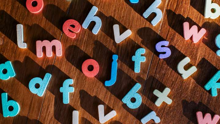 Random letters covering a tabletop.