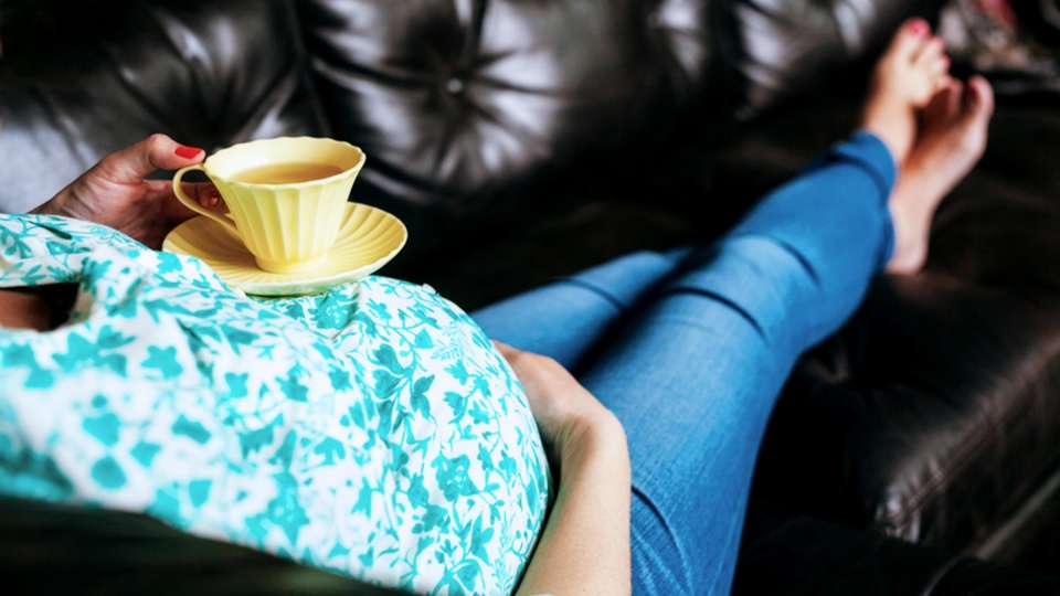 pregnant-woman-holding-teacup