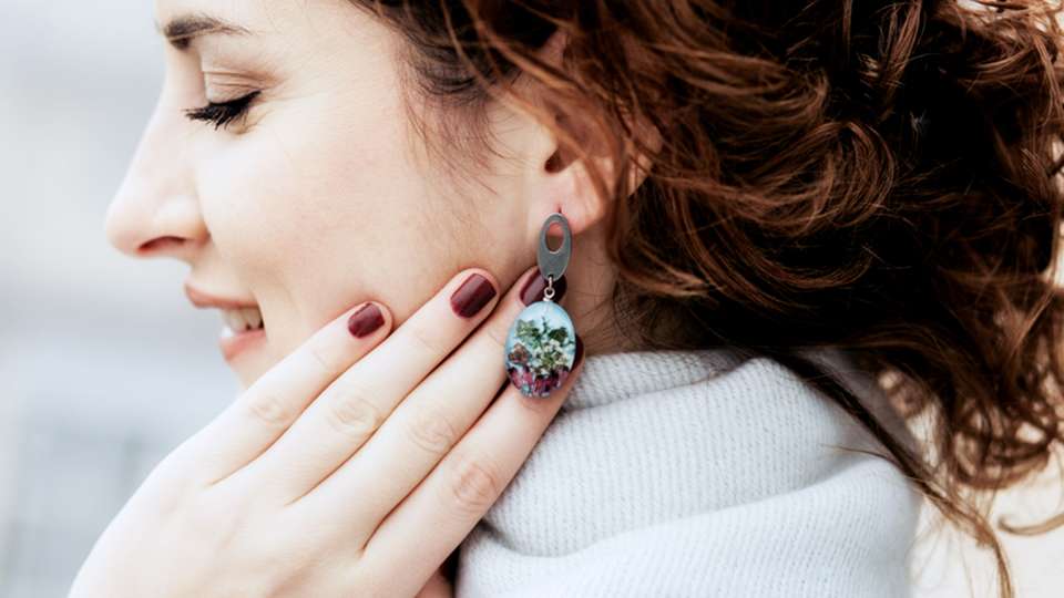 woman wearing earrings