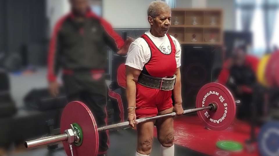 Winifred Pristell lifting weights