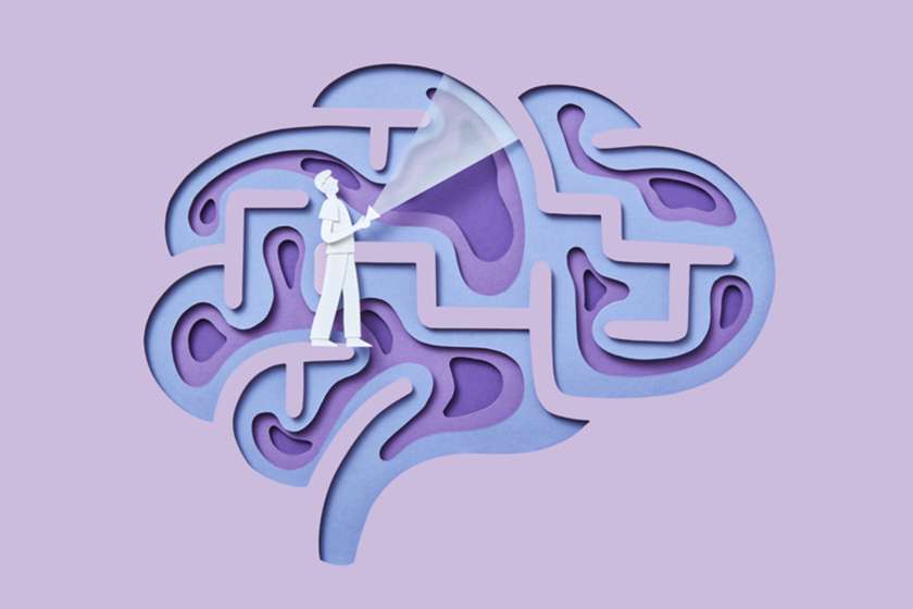 An illustration of a person finding their way through a brain-shaped maze.