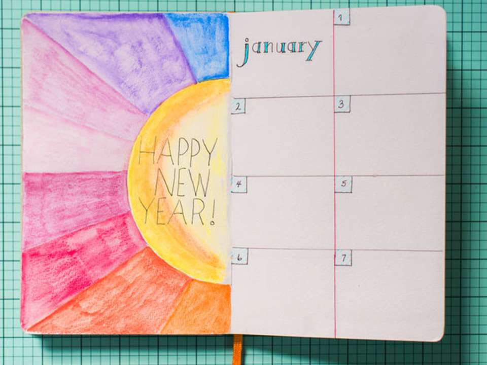 Notebook calendar open to January 