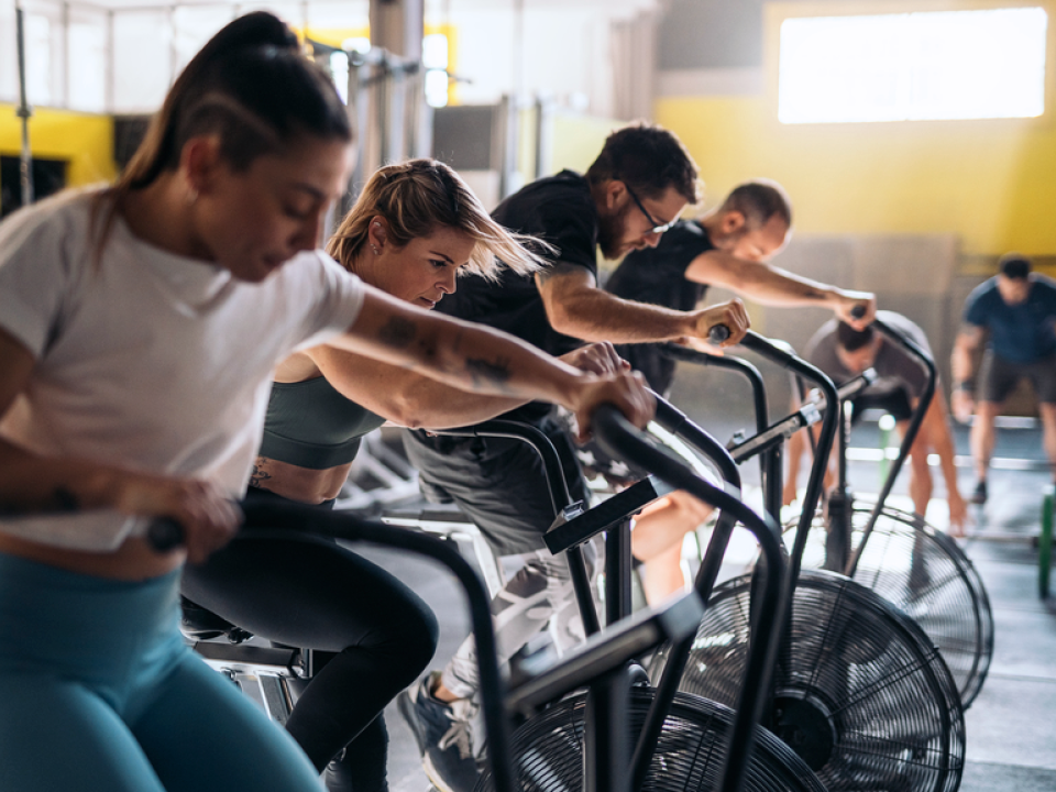 A photo of people during a spin class