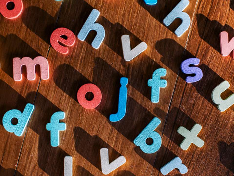 Random letters covering a tabletop.